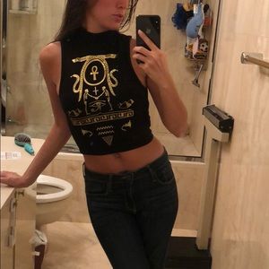 Small, high neck crop top